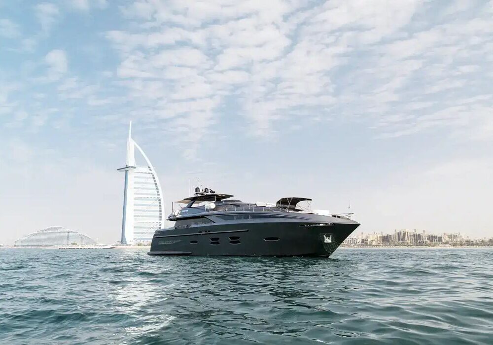 Queen Santorini – Burj Al Arab exterior Santorini yacht with Burj Al Arab backdrop