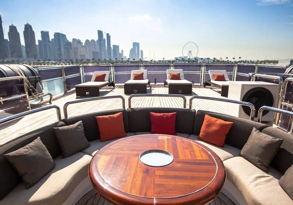 Queen Skyfall – deck lounge, Dubai skyline Skyfall deck lounge with Dubai skyline
