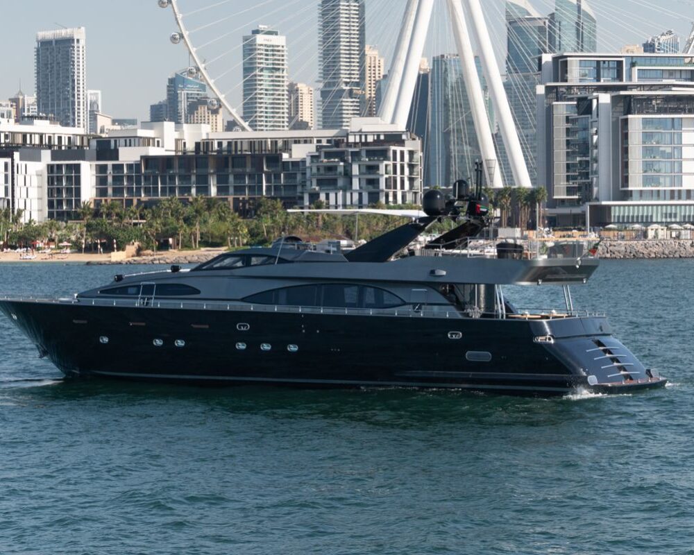 Spectre yacht with Dubai skyline backdrop