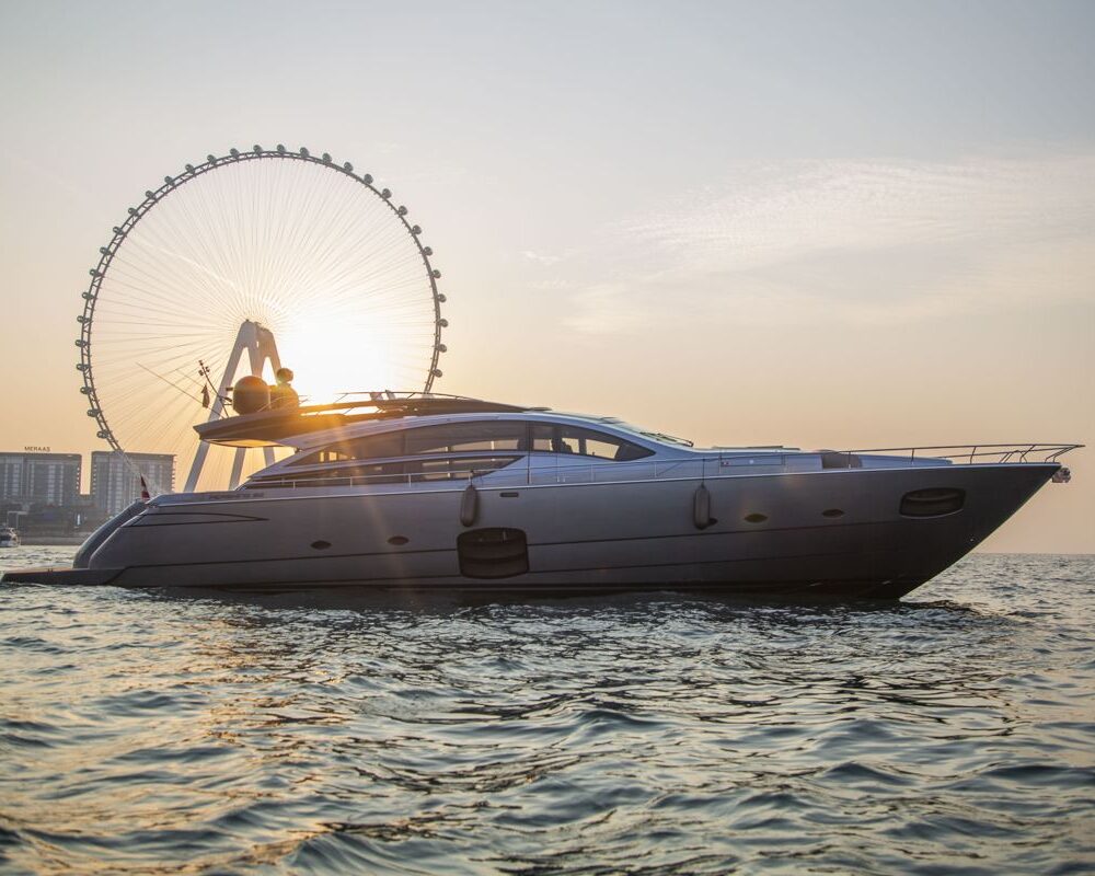 Queen Straga – Dubai skyline exterior Straga yacht with Ain Dubai ferris wheel backdrop